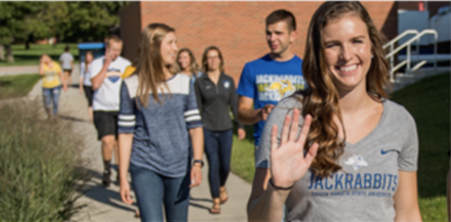 Image of students walking and waving Image of students walking and waving